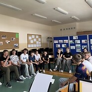 Teenagers participating in a disability awareness discussion led by an expert.